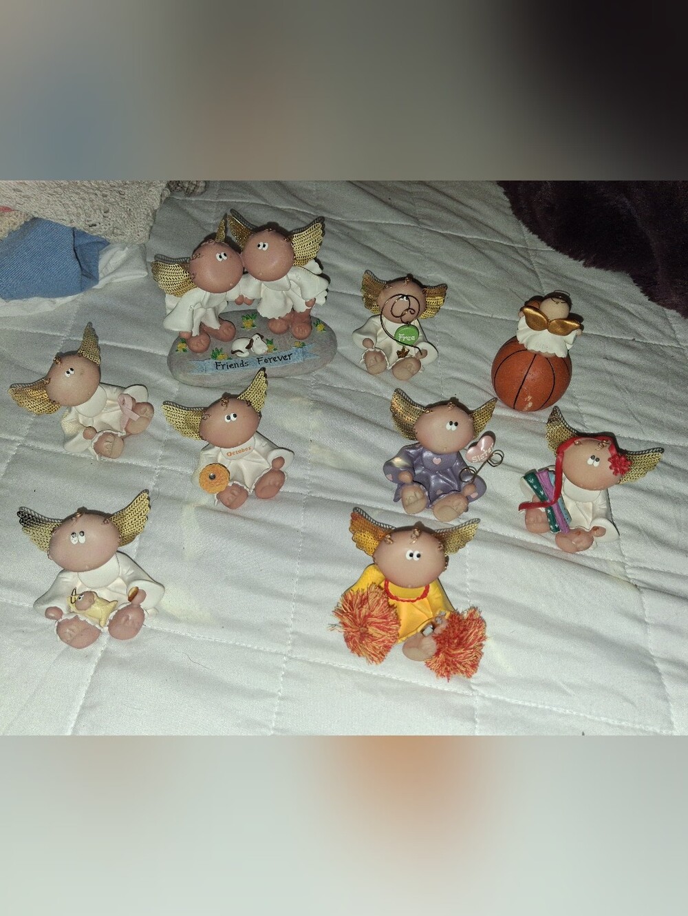 Assorted Yellow Accent Angel Figurine Collection
